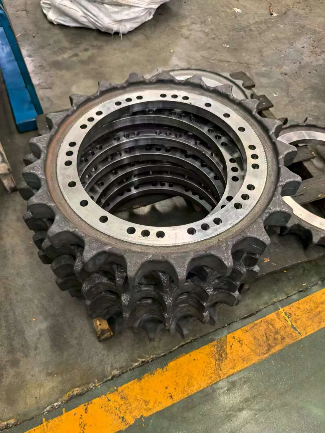 Excavator drive sprockets and segments