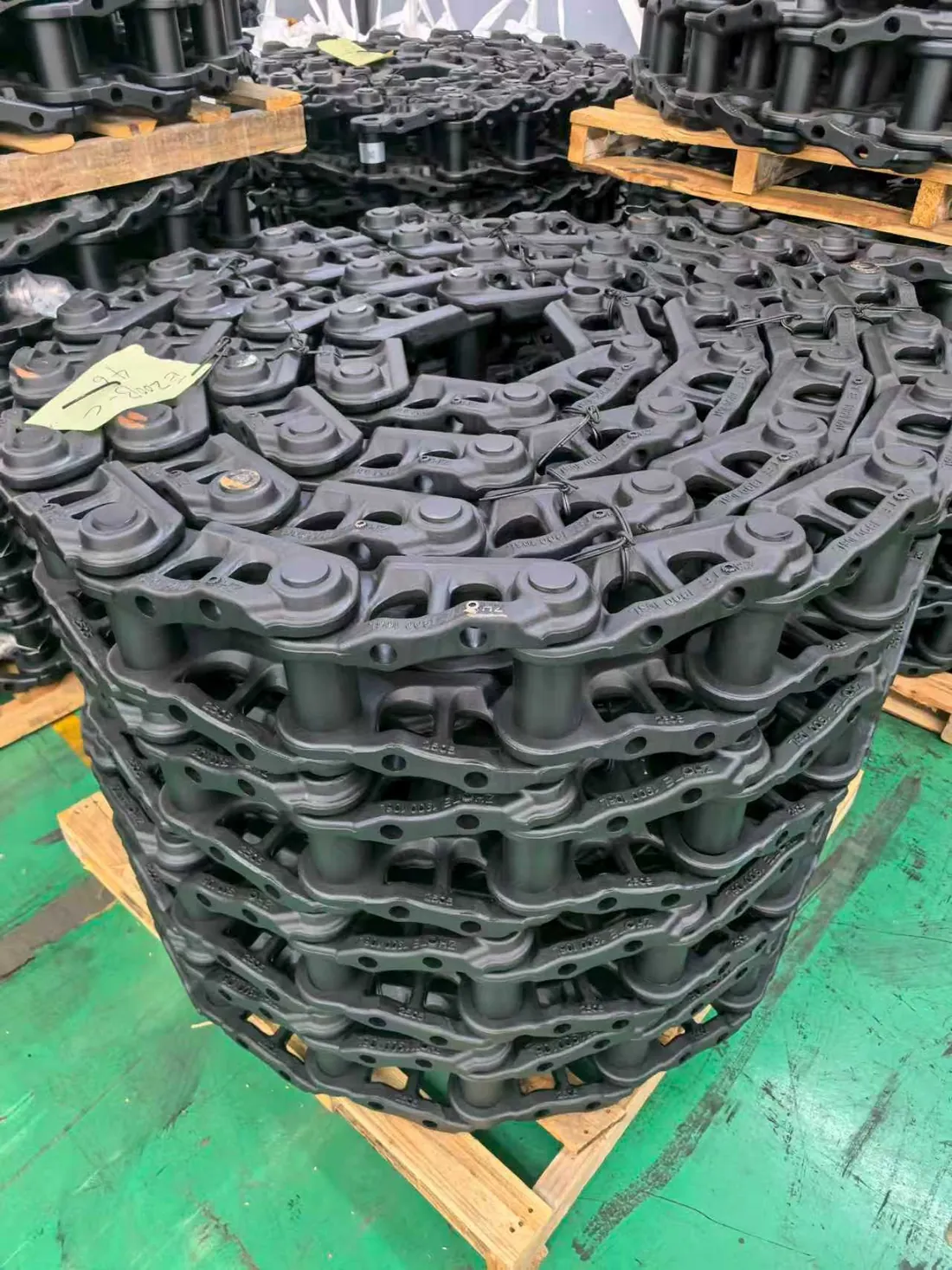 Excavator track chain assemblies